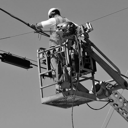 an electric company worker